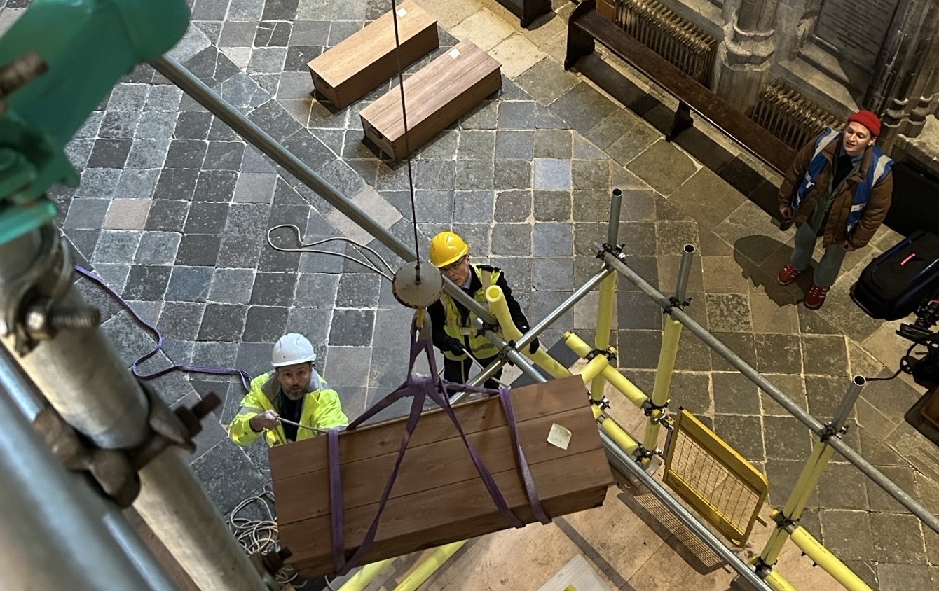 Bones reinterred in Winchester Cathedral mortuary chests after more than a decade of analysis and reorganisation